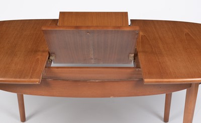 Lot 365 - Jentique, England: a mid 20th Century oval extending dining table and six chairs.