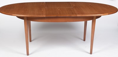 Lot 365 - Jentique, England: a mid 20th Century oval extending dining table and six chairs.