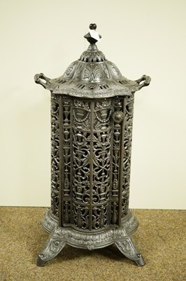 Lot 84 - A Victorian cast metal cathedral heater.