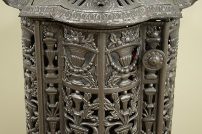 Lot 84 - A Victorian cast metal cathedral heater.