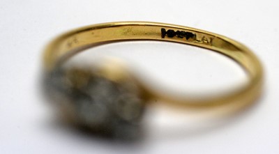 Lot 174 - A three stone diamond ring