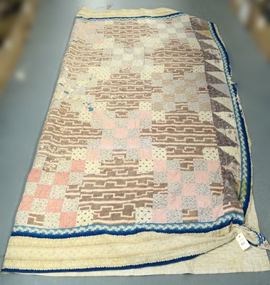Lot 411 - An early Victorian patchwork quilt