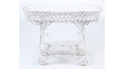 Lot 1251 - An ornate Regency style wirework plant stand.