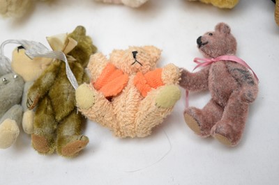 Lot 222 - A collection of miniature collectors' teddy bears.