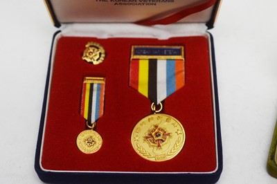 Lot 126 - A pair of Korean medals, and other medals