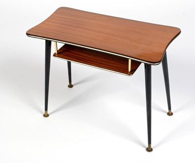 Lot 368 - A mid Century teak and ebonised atomic-style coffee table.
