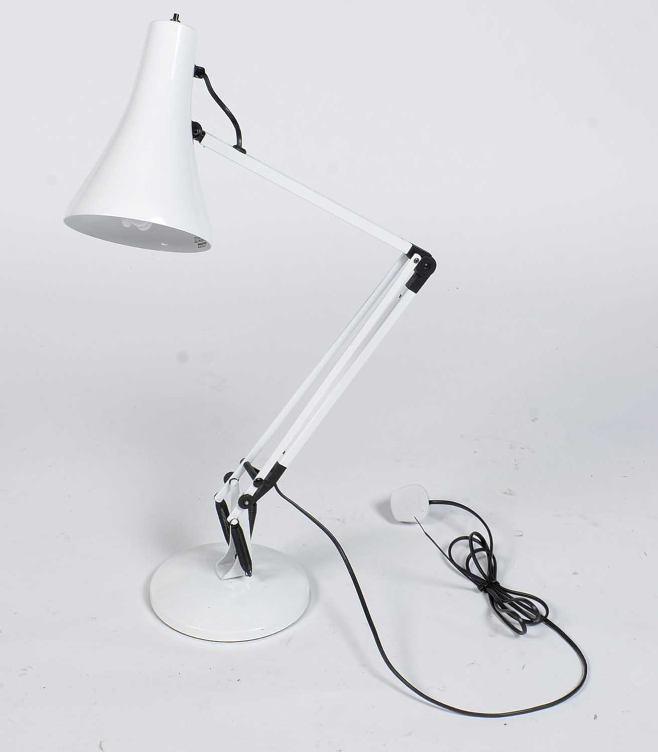 Lot 401 - A Herbert Terry anglepoise lamp in white.