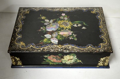 Lot 319 - A Victorian inlaid and enamel decorated lacquered writing box.