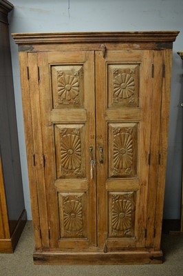 Lot 67 - A carved cupboard in the 19th Century Anglo-Indian style