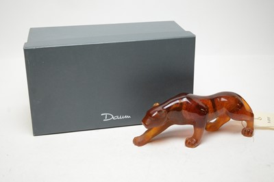 Lot 380 - A Daum crystal figure of a panther, in amber.