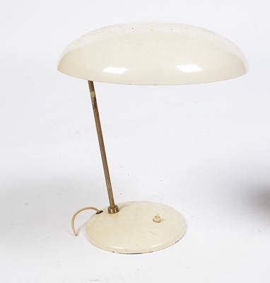 Lot 405 - Manner of Phillips: a cream painted metal desk lamp.