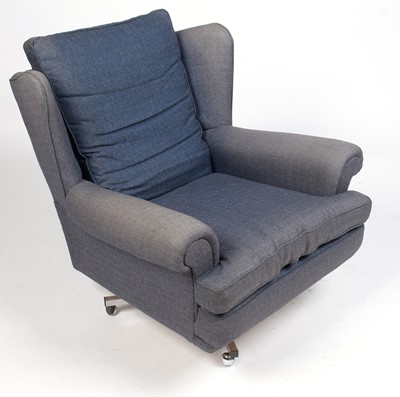 Lot 394 - A mid Century swivel armchair.