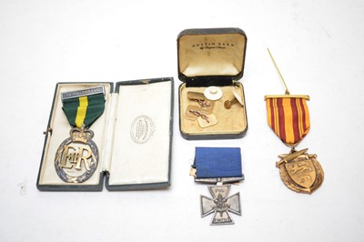 Lot 195 - A pair of 9ct yellow gold cufflinks and military medals.