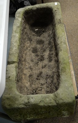 Lot 85 - A stone composite trough garden planter.