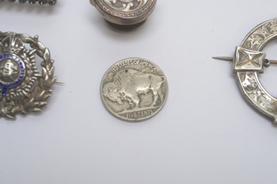 Lot 142 - A selection of silver and other brooches, and other items