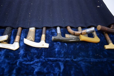 Lot 262 - A collection of cane or parasol handles.