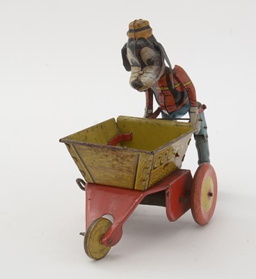 Lot 336 - Marx for Walt Disney Productions: a tin plate lithograph printed clockwork Goofy the Gardener toy