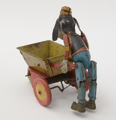 Lot 336 - Marx for Walt Disney Productions: a tin plate lithograph printed clockwork Goofy the Gardener toy