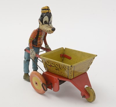 Lot 337 - Marx for Walt Disney Productions: a tin plate lithograph printed clockwork Goofy the Gardener toy