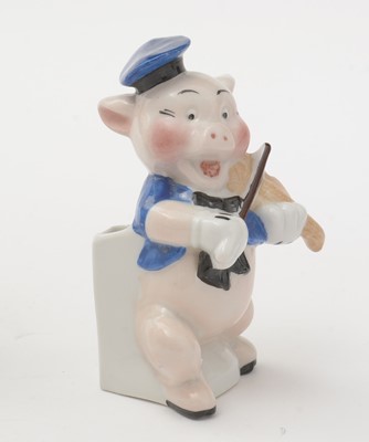 Lot 338 - Genuine Walt Disney copyright ceramic Three Little Pigs toothbrush holders