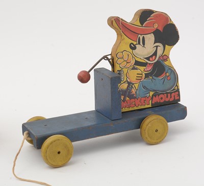 Lot 349 - Two Disney carts and a handcar toy