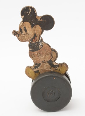 Lot 352 - Four Mickey Mouse pull/push along toys