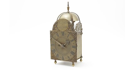 Lot 1207 - A brass lantern wall clock with passing strike.