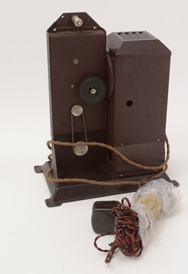 Lot 360 - Kodatoy Universal Model Safety Film Projector; and other Disney reels and films.