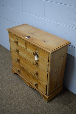 Lot 9 - A 19th Century/20th Century stripped pine chest.