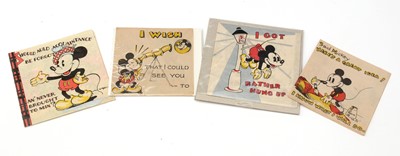 Lot 389 - Mickey Mouse: four block printed folded paper books.