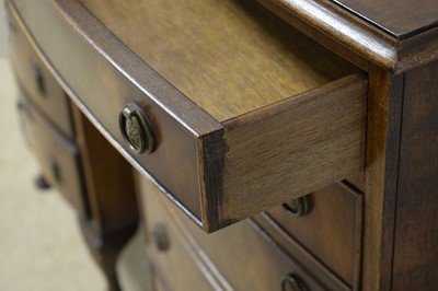 Lot 26 - An miniature bowfront walnut chest on chest; and another bowfront chest