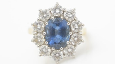 Lot 469 - A sapphire and diamond cluster ring