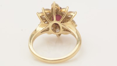 Lot 470 - A ruby and diamond cluster ring