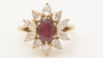 Lot 470 - A ruby and diamond cluster ring
