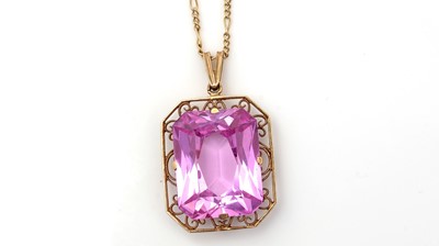 Lot 473 - A synthetic pink sapphire pendant