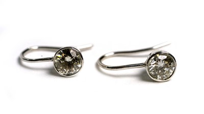 Lot 502 - A pair of diamond earrings