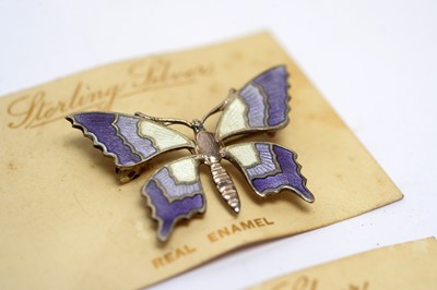 Lot 149 - Six silver and enamel butterfly pattern brooches