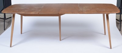 Lot 29 - Ercol: a Windsor elm and beech extending dining table.