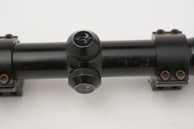 Lot 760 - A Swarovski Habicht rifle scope, and another by Leupold