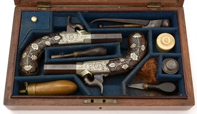 Lot 761 - A cased pair of 19th Century percussion pistols, by Smith