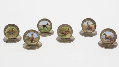 Lot 629 - An Edward VII set of six enamelled silver menu stands/place markers
