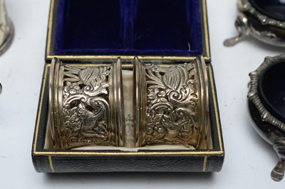 Lot 176 - A pair of silver napkin rings and other items of silver and metalware