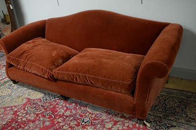 Lot 97 - A large camel back sofa by Peter Dudgeon.