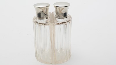 Lot 615 - A pair of French 950 standard silver mounted cut glass decanters