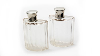 Lot 615 - A pair of French 950 standard silver mounted cut glass decanters