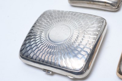 Lot 145 - Four silver cigarette cases and another.