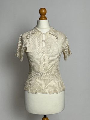 Lot 833 - A 1940s Burmese "Rollo" handmade silk blouse