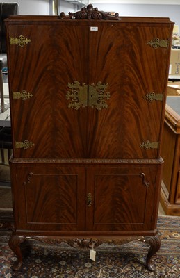Lot 61 - Maple: a mid Century figured mahogany cocktail cabinet.