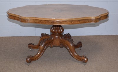 Lot 25 - A Victorian burr walnut and walnut Looe table.