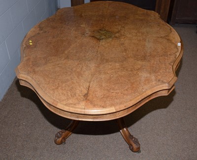 Lot 25 - A Victorian burr walnut and walnut Looe table.
